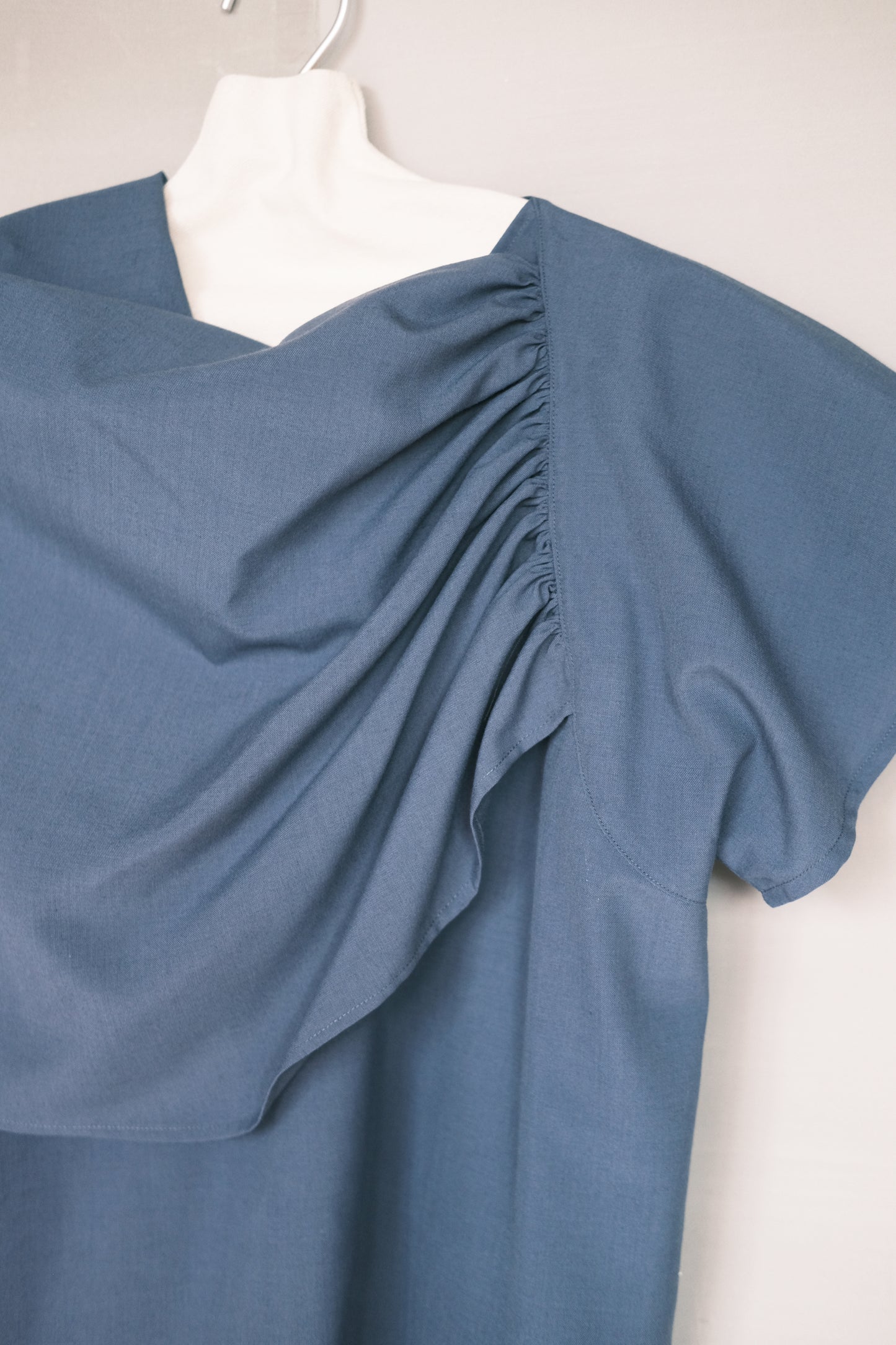 wool- blend asymmetric draped-neckline top (pre-order)