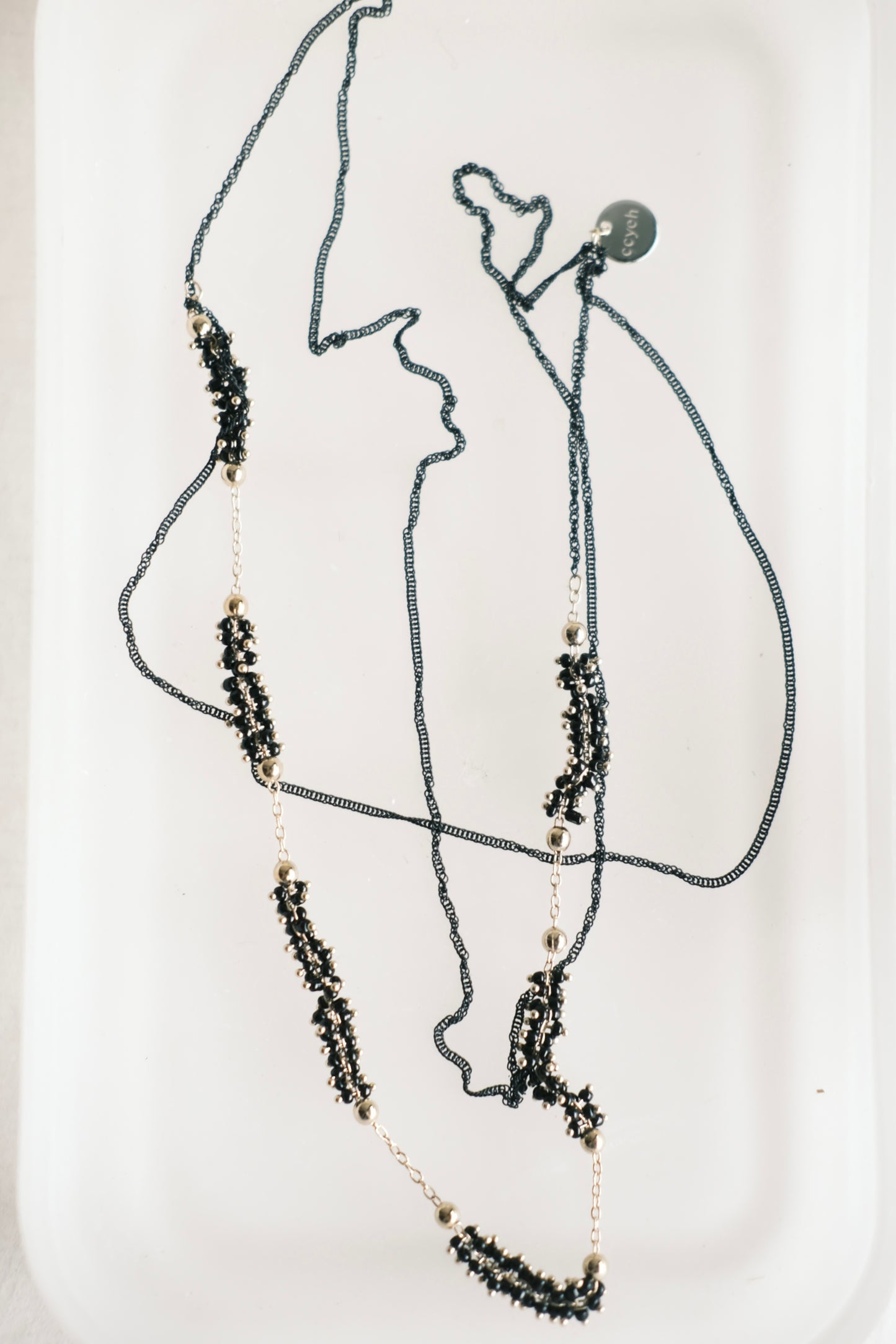 black & gold necklace