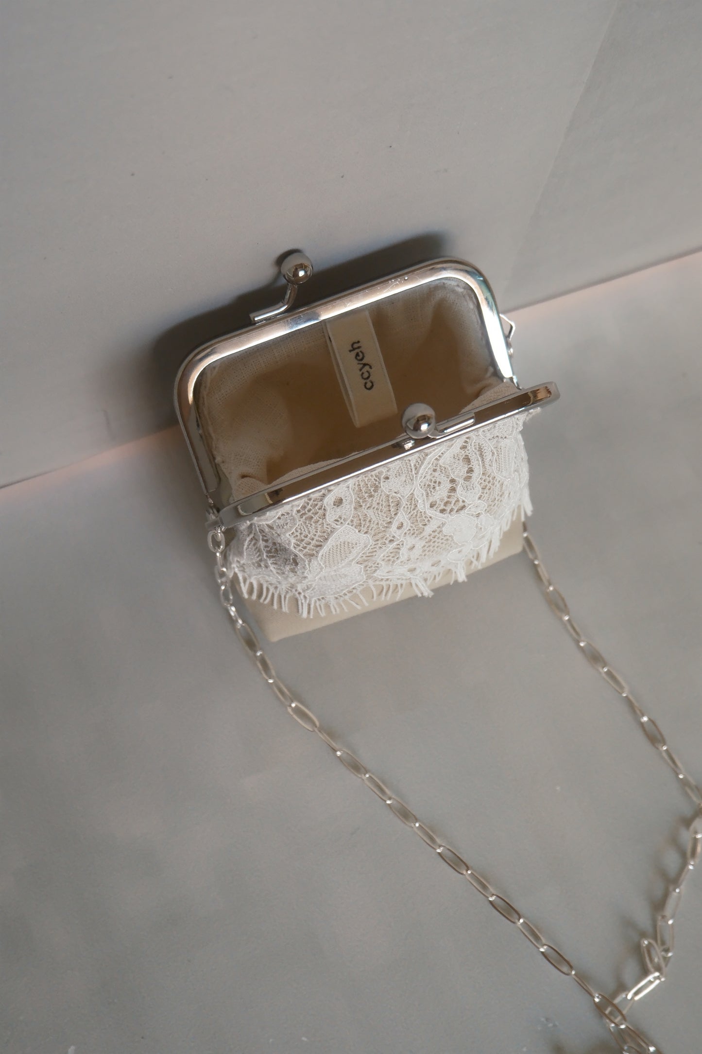 matcha green lace patchwork kiss-lock purse