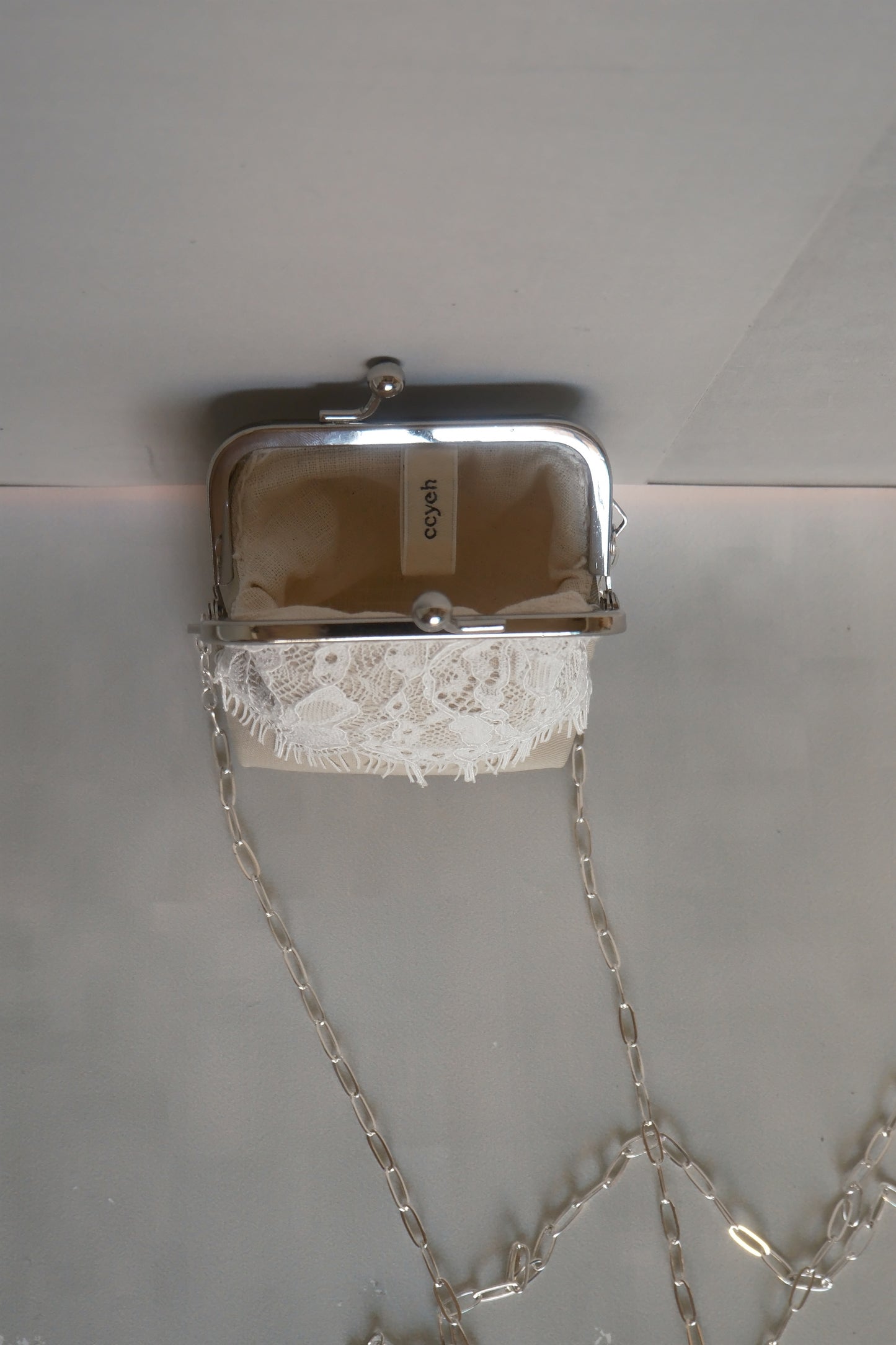 matcha green lace patchwork kiss-lock purse